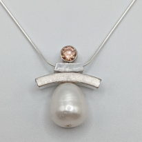 Balance Inukshuk Necklace with Pink Cubic Zirconia & Freshwater Pearl by Chi's Creations at The Avenue Gallery, a contemporary fine art gallery in Victoria, BC, Canada.