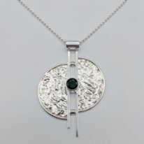 Split Full Moon Pendant with Chrome Diopside by A & R Jewellery at The Avenue Gallery, a contemporary fine art gallery in Victoria, BC, Canada.