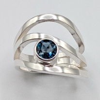 Wind Design Ring with London Blue Topaz by A & R Jewellery at The Avenue Gallery, a contemporary fine art gallery in Victoria, BC, Canada.