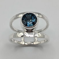 Double Band Ring with London Blue Topaz by A & R Jewellery at The Avenue Gallery, a contemporary fine art gallery in Victoria, BC, Canada.