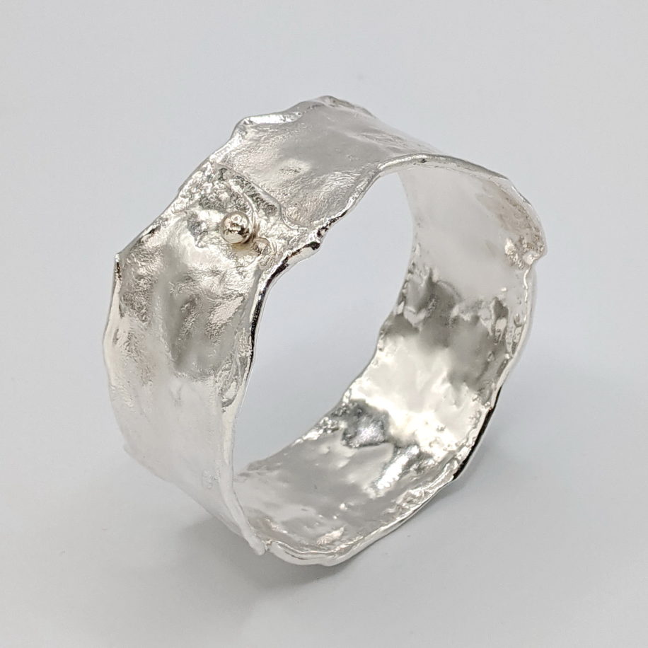 Wide Reticulated Silver Bangle with Gold Ball by Barb Adams at The Avenue Gallery, a contemporary fine art gallery in Victoria, BC, Canada.