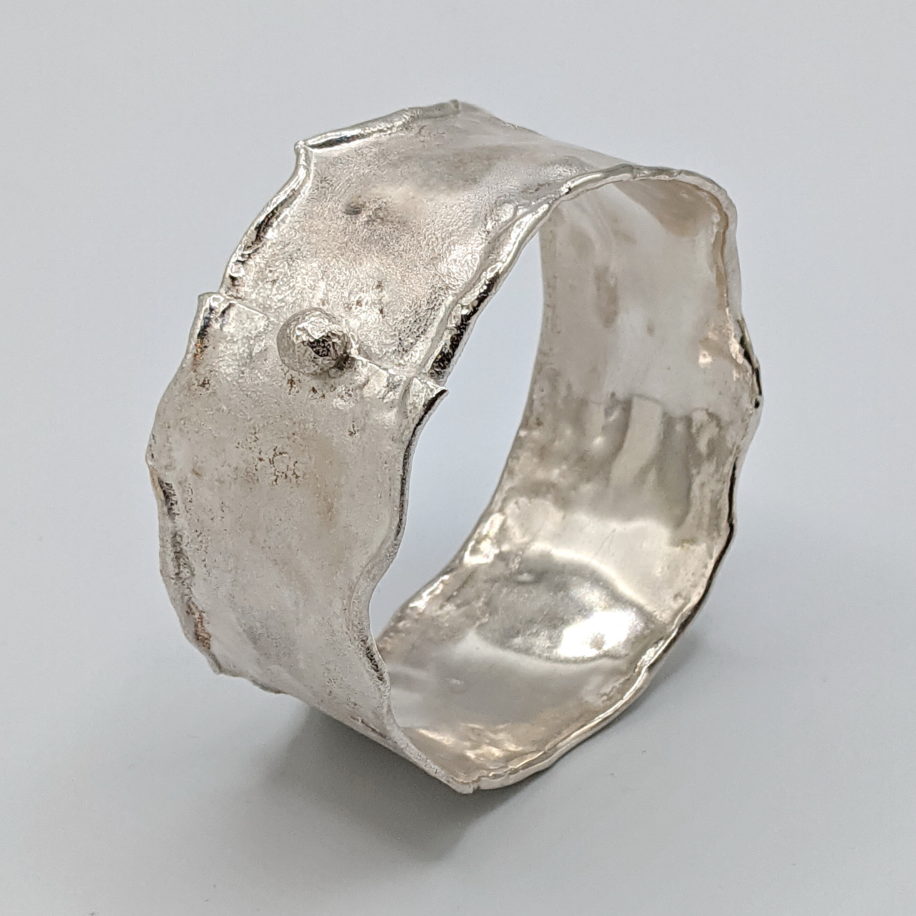 Wide Reticulated Silver Bangle with Silver Ball by Barbara Adams at The Avenue Gallery, a contemporary fine art gallery in Victoria, BC, Canada.