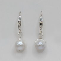 White Baroque Freshwater Pearl Earrings with Hammered Sterling Silver Wires by Val Nunns at The Avenue Gallery, a contemporary fine art gallery in Victoria, BC, Canada.