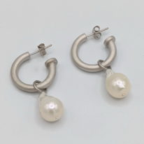 Small White Baroque Pearls on Rhodium Plated Silver Hoop Earrings by Val Nunns at The Avenue Gallery, a contemporary fine art gallery in Victoria, BC, Canada.