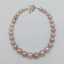Large Pale Pink Freshwater Pearl Necklace with Hammered Sterling Silver Clasp by Val Nunns at The Avenue Gallery, a contemporary fine art gallery in Victoria, BC, Canada.