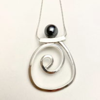 Balanced Scroll Necklace with Hematite by Chi's Creations at The Avenue Gallery, a contemporary fine art gallery in Victoria, BC, Canada.