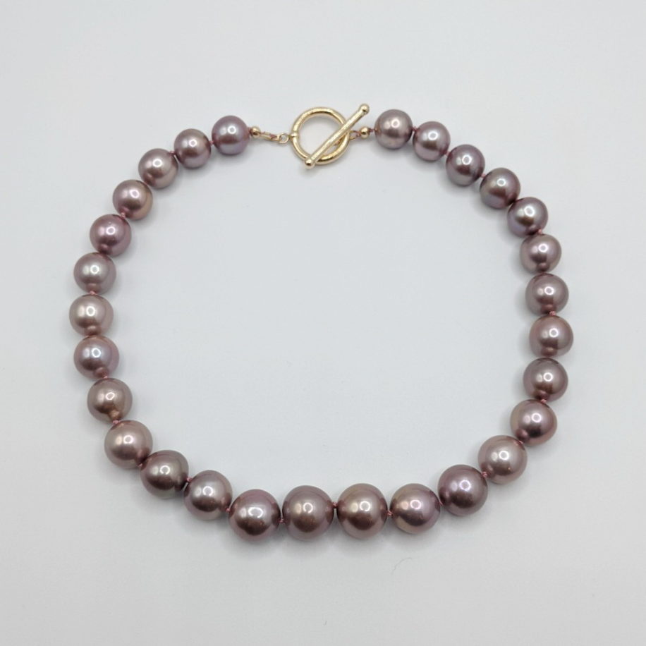 Large Edison Pearl Necklace with Gold-fill Toggle Clasp by Val Nunns at The Avenue Gallery, a contemporary fine art gallery in Victoria, BC, Canada.