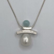 Balance Inukshuk Necklace with Aquamarine & White Pearl by Chi's Creations at The Avenue Gallery, a contemporary fine art gallery in Victoria, BC, Canada.