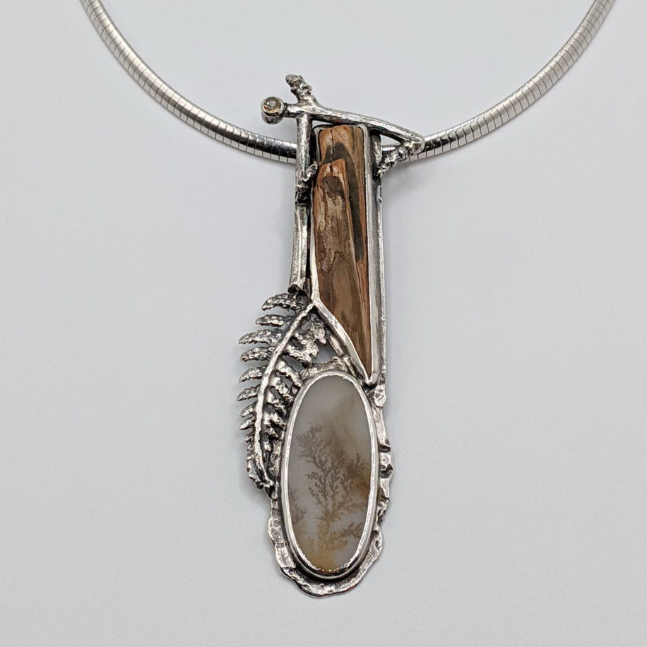 Dendritic Agate & Mammoth Ivory Pendant by Andrea Russell at The Avenue Gallery, a contemporary fine art gallery in Victoria, BC, Canada.