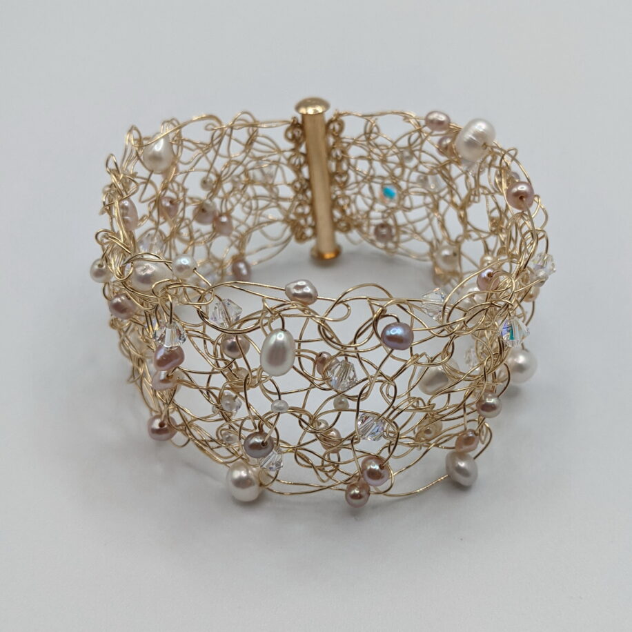 Gold-Fill Wire Crochet Bracelet with White Pearls & Swarovski Crystals by Veronica Stewart at The Avenue Gallery, a contemporary fine art gallery in Victoria, BC, Canada.