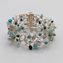 Gold-Fill Crochet Bracelet with Turquoise, Pearls & Swarovski Crystals by Veronica Stewart at The Avenue Gallery, a contemporary fine art gallery in Victoria, BC, Canada.