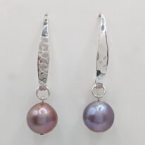 Edison Pearl Earrings on Hammered Sterling Silver by Val Nunns at The Avenue Gallery, a contemporary fine art gallery in Victoria, BC, Canada.