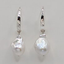 White Baroque Pearl & Hammered Sterling Silver Earrings by Val Nunns at The Avenue Gallery, a contemporary fine art gallery in Victoria, BC, Canada.