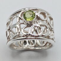 Pebbles Ring with Peridot by A & R Jewellery at The Avenue Gallery, a contemporary fine art gallery in Victoria, BC, Canada.