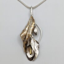 Argentium Silver, Sterling Silver & Silver Infused Bronze Pendant by Darlene Letendre at The Avenue Gallery, a contemporary fine art gallery in Victoria, BC, Canada.