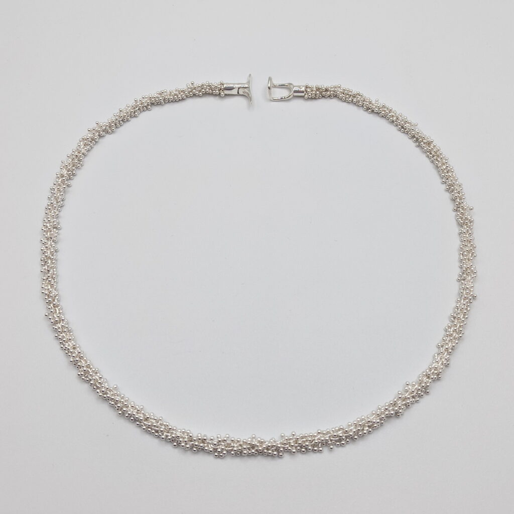 Narrow ShikShok Necklace by MichaudMichaud Design at The Avenue Gallery, a contemporary fine art gallery in Victoria, BC, Canada.