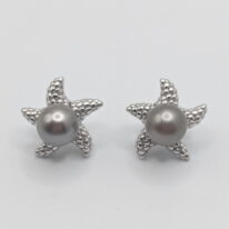 Starfish Sterling Silver Earrings mounted with Tahitian Pearls by Val Nunns at The Avenue Gallery, a contemporary fine art gallery in Victoria, BC, Canada.