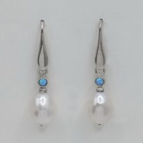 Sterling Silver Setting with a Small Opal and Freshwater Pearl by Val Nunns at The Avenue Gallery, a contemporary fine art gallery in Victoria, BC, Canada.