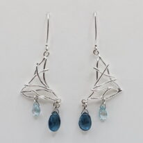 Twig Earrings with London Blue & Swiss Topaz by A & R Jewellery at The Avenue Gallery, a contemporary fine art gallery in Victoria, BC, Canada.