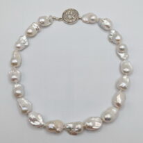 White Baroque Pearl Necklace with Sterling Silver Clasp by Val Nunns at The Avenue Gallery, a contemporary fine art gallery in Victoria, BC, Canada.