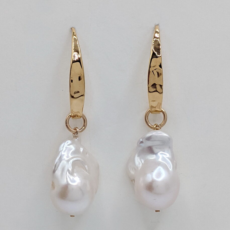 White Baroque Pearl Earrings with Hammered 14kt. Gold-Plated Wires by Val Nunns at The Avenue Gallery, a contemporary fine art gallery in Victoria, BC, Canada.
