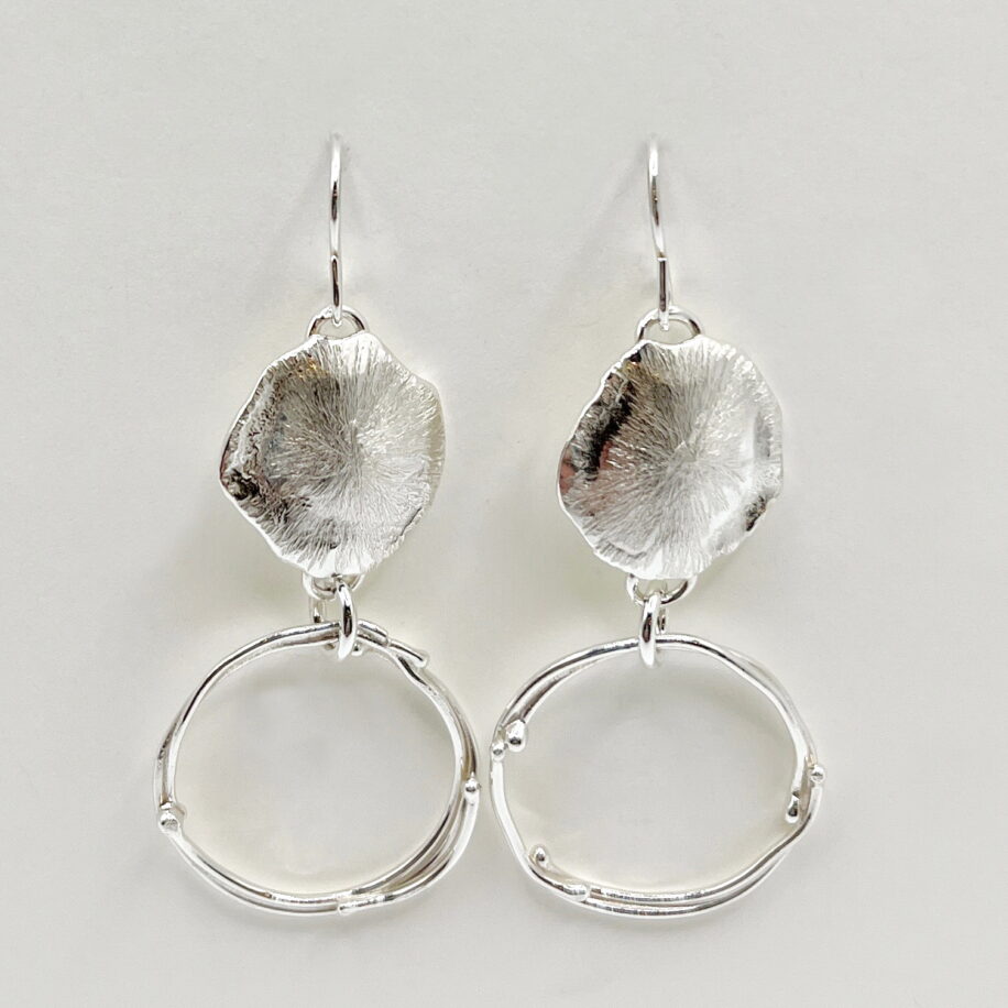 Boulder Below Sun Earrings by A & R Jewellery at The Avenue Gallery, a contemporary fine art gallery in Victoria, BC, Canada.