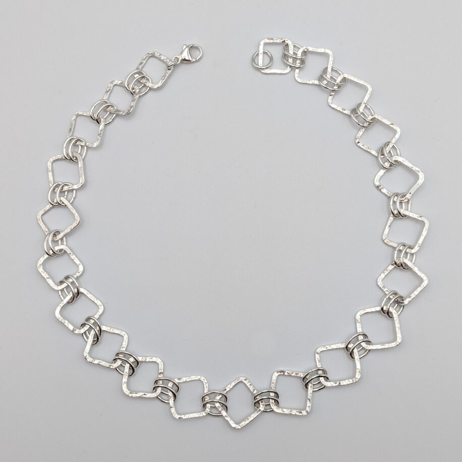 Hammered Diamond-Shaped Link Necklace by A & R Jewellery at The Avenue Gallery, a contemporary fine art gallery in Victoria, BC, Canada.