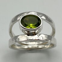 Round Double-Band Ring with Peridot by A & R Jewellery at The Avenue Gallery, a contemporary fine art gallery in Victoria, BC, Canada.