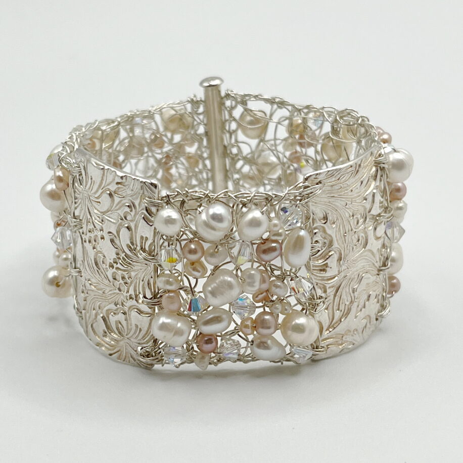 Fine Silver Crochet Cuff with Textured Bars, White and Pink Pearls, and Clear Swarovski Crystals by Veronica Stewart at The Avenue Gallery, a contemporary fine art gallery in Victoria, BC, Canada.