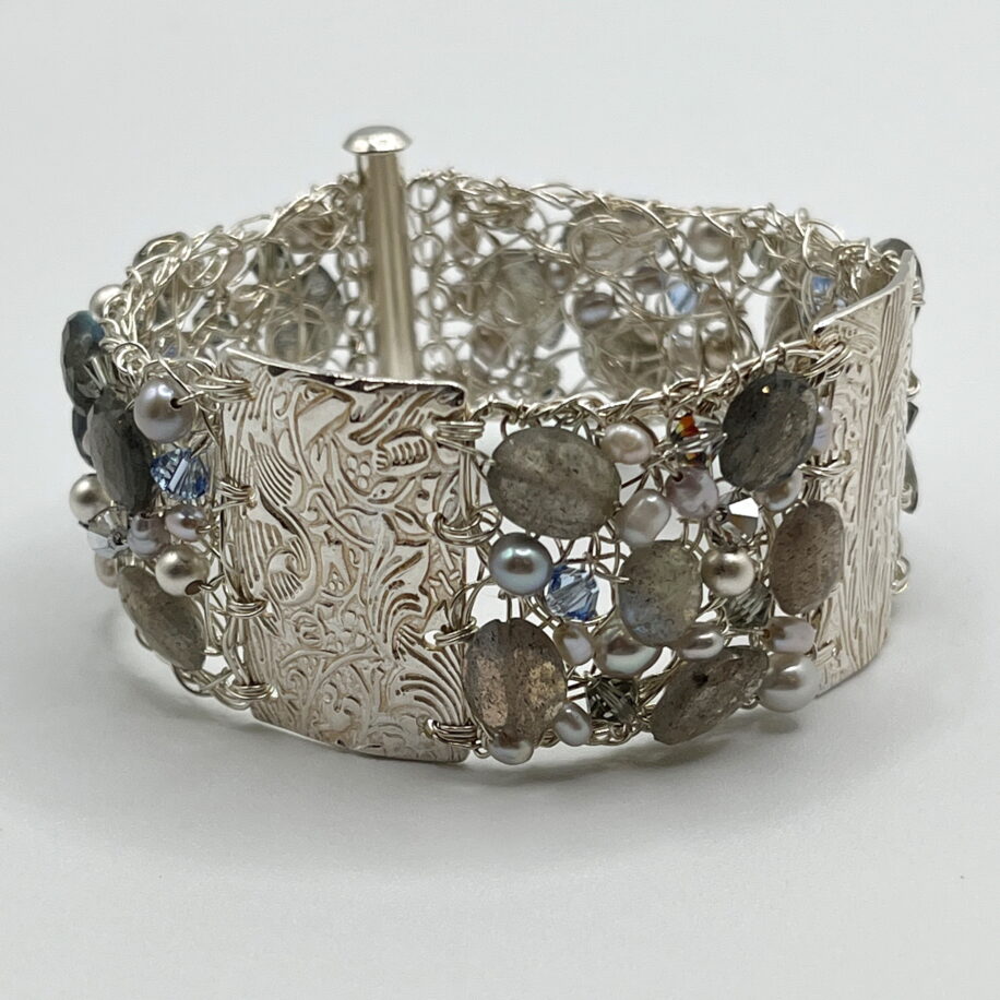 Fine Silver Crochet Cuff with Textured Bars, Labradorite, Silver Pearls, and Grey Swarovski Crystals by Veronica Stewart at The Avenue Gallery, a contemporary fine art gallery in Victoria, BC, Canada.