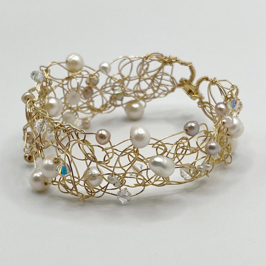 Gold Fill Crochet Cuff with Pearls and Swarovski Crystals by Veronica Stewart at The Avenue Gallery, a contemporary fine art gallery in Victoria, BC, Canada.