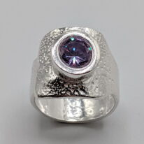 Fine Silver Ring with Purple Round Cubic Zirconia by Veronica Stewart at The Avenue Gallery, a contemporary fine art gallery in Victoria, BC, Canada.