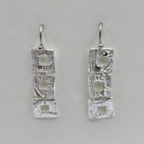 Tiny Textured Square Earrings by Veronica Stewart at The Avenue Gallery, a contemporary fine art gallery in Victoria, BC, Canada.