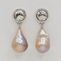 Pink Baroque Pearl Earrings with Sterling Silver Hammered Button Posts by Val Nunns at The Avenue Gallery, a contemporary fine art gallery in Victoria, BC, Canada.