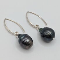 Large Dark Tahitian Pearl Earrings with Hammered Sterling Silver Wires by Val Nunns at The Avenue Gallery, a contemporary fine art gallery in Victoria, BC, Canada.