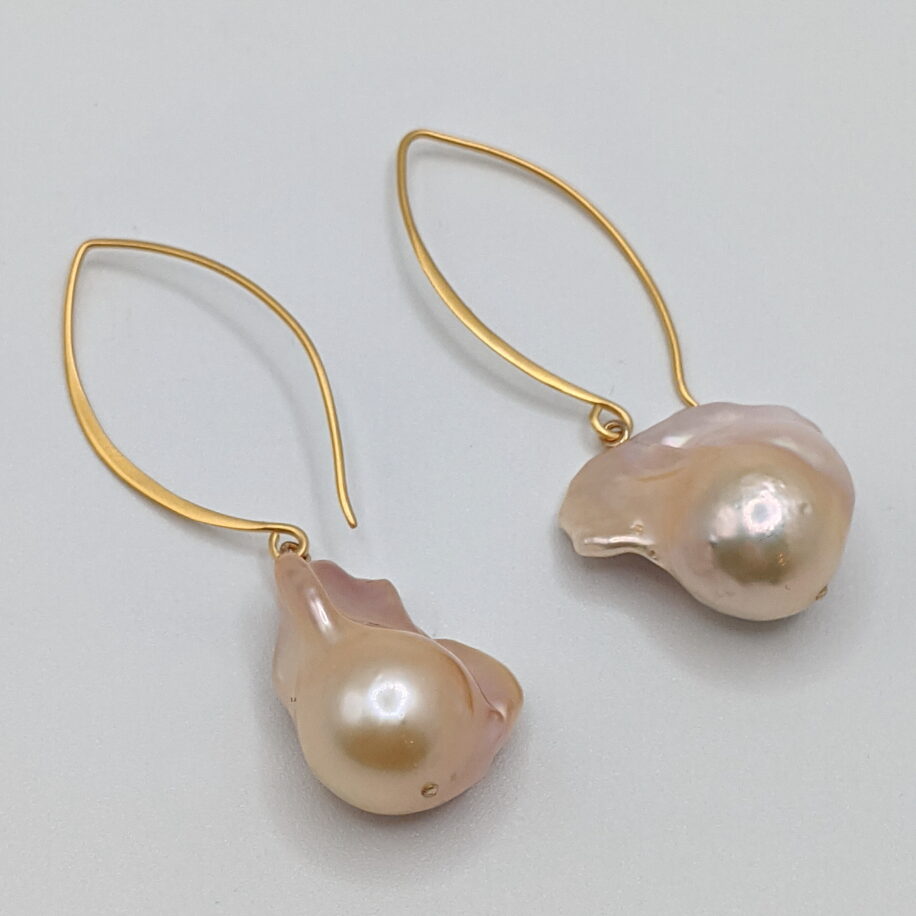 Pink Baroque Pearl Earrings with Long Thin Gold Plated Wires by Val Nunns at The Avenue Gallery, a contemporary fine art gallery in Victoria, BC, Canada.