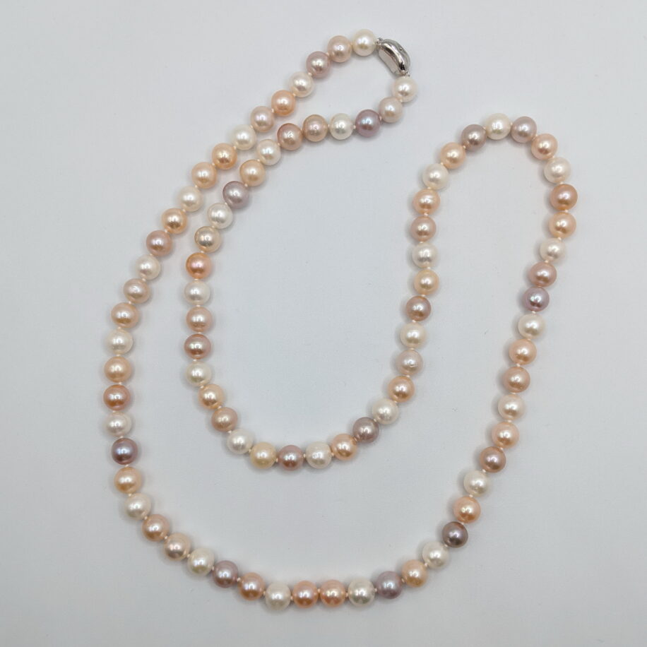 Pink Edison Pearl Necklace with Button Style Sterling Silver Clasp by Val Nunns at The Avenue Gallery, a contemporary fine art gallery in Victoria, BC, Canada.