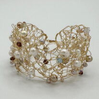Gold-Fill Crochet Cuff with Brown & Gold Swarovski Crystals and White & Gold Pearls by Veronica Stewart at The Avenue Gallery, a contemporary fine art gallery in Victoria, BC, Canada.