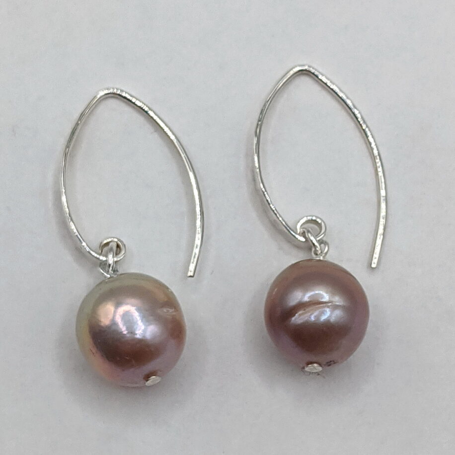 Edison Pearl Earrings with Hammered Sterling Silver Wires by Val Nunns at The Avenue Gallery, a contemporary fine art gallery in Victoria, BC, Canada.