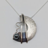 The Balance Double Line Necklace by Chi's Creations at The Avenue Gallery, a contemporary fine art gallery in Victoria, BC, Canada.