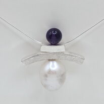 Balanced Inukshuk Necklace with Amethyst & Pearl by Chi's Creations at The Avenue Gallery, a contemporary fine art gallery in Victoria, BC, Canada.