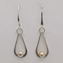 Hollow Teardrop Earrings with Pink Pearls by A & R Jewellery at The Avenue Gallery, a contemporary fine art gallery in Victoria, BC, Canada.