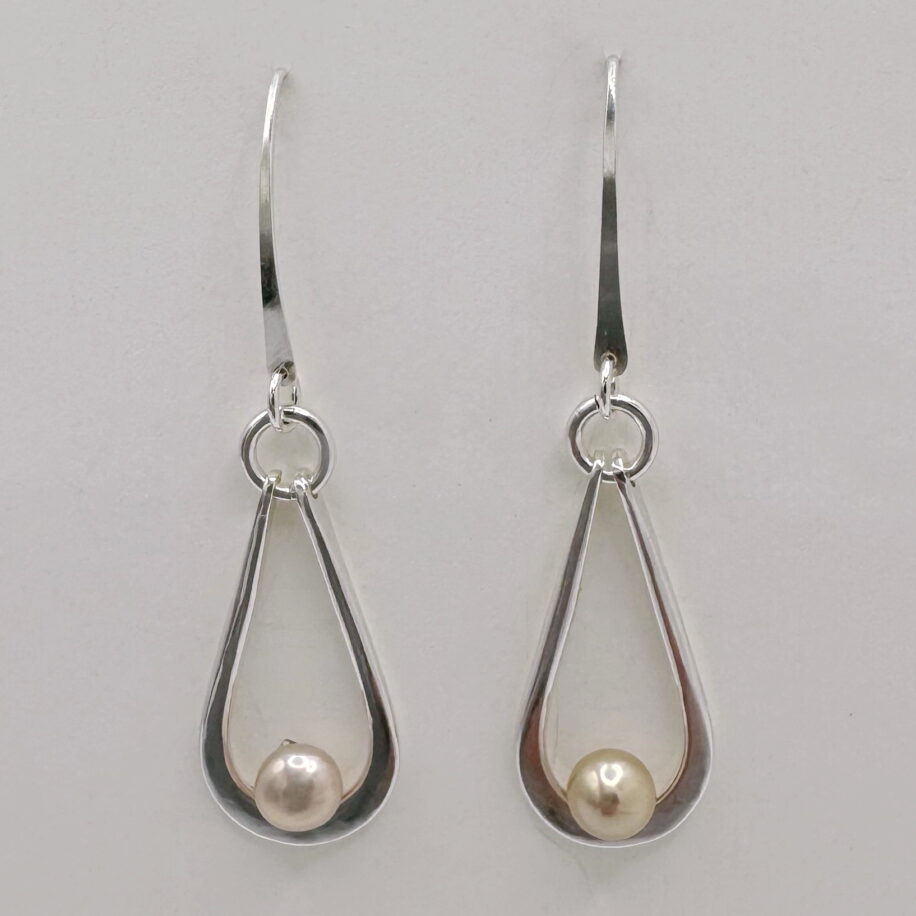 Hollow Teardrop Earrings with Pink Pearls by A & R Jewellery at The Avenue Gallery, a contemporary fine art gallery in Victoria, BC, Canada.