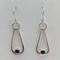 Hollow Teardrop Earrings with Garnet by A & R Jewellery at The Avenue Gallery, a contemporary fine art gallery in Victoria, BC, Canada.