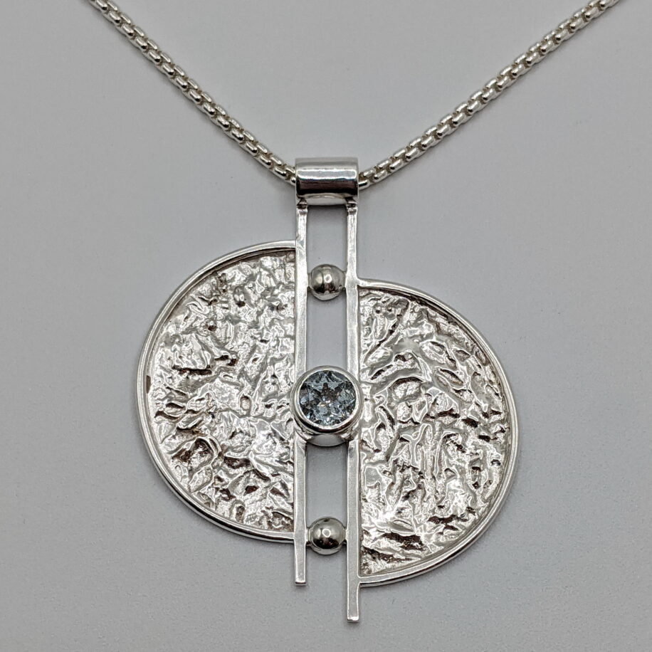 Split Moon Pendant with White Topaz by A & R Jewellery at The Avenue Gallery, a contemporary fine art gallery in Victoria, BC, Canada.