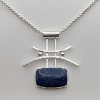 Curved Bars Pendant with Lapis by A & R Jewellery at The Avenue Gallery, a contemporary fine art gallery in Victoria, BC, Canada.