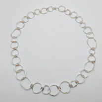 Freeform Circle Argentium Silver Necklace by A & R Jewellery at The Avenue Gallery, a contemporary fine art gallery in Victoria, BC, Canada.