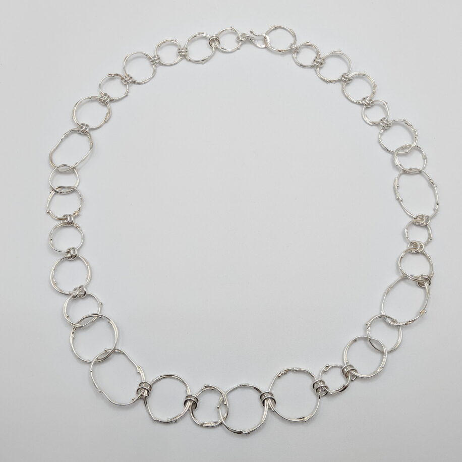 Freeform Circle Argentium Silver Necklace by A & R Jewellery at The Avenue Gallery, a contemporary fine art gallery in Victoria, BC, Canada.