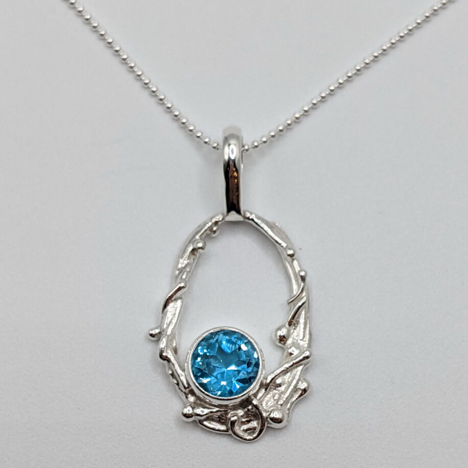 Freeform Circle Pendant with Swiss Topaz by A & R Jewellery at The Avenue Gallery, a contemporary fine art gallery in Victoria, BC, Canada.