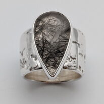 River Band Ring with Tourmalated Quartz by A & R Jewellery at The Avenue Gallery, a contemporary fine art gallery in Victoria, BC, Canada.